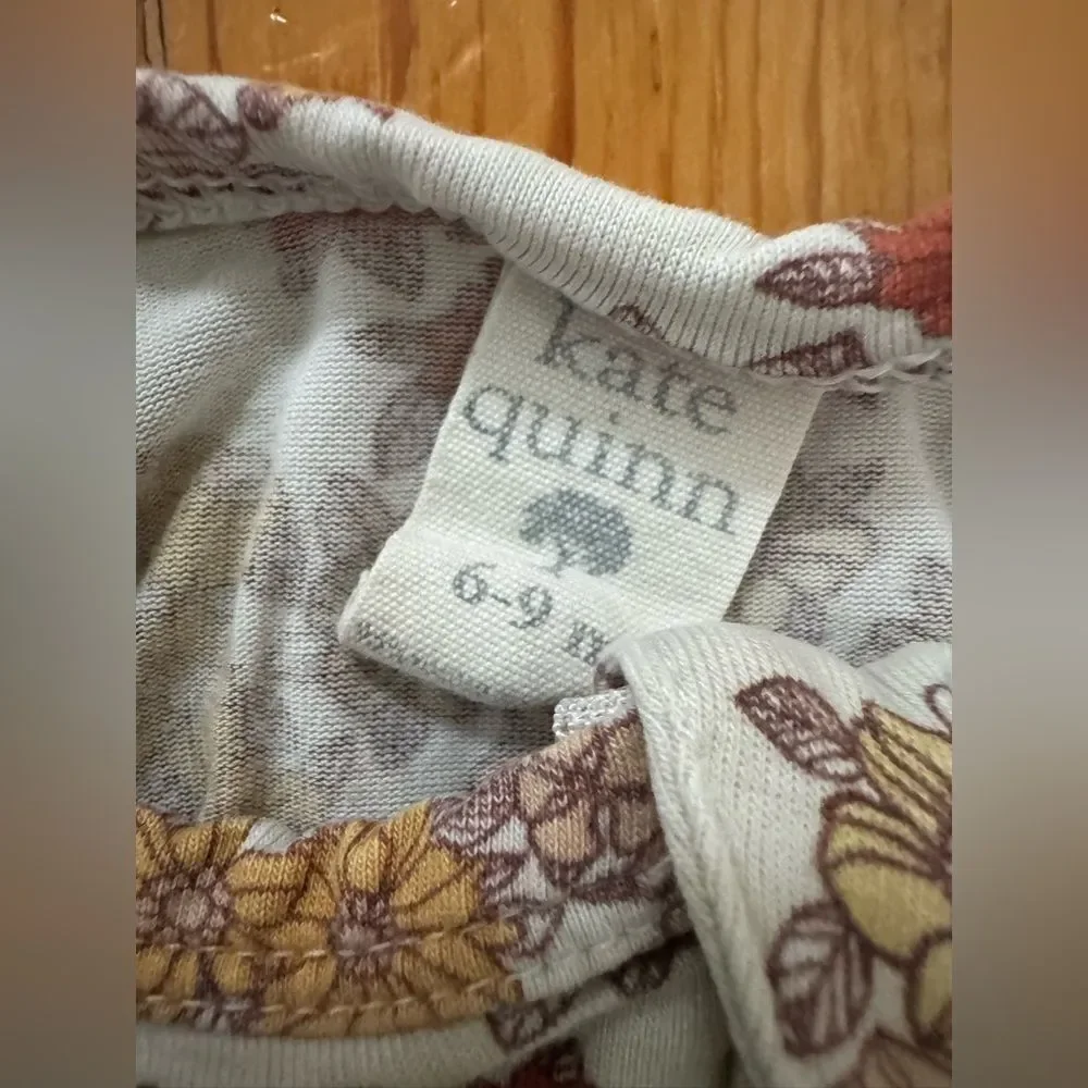 Kate Quinn Floral Onesie